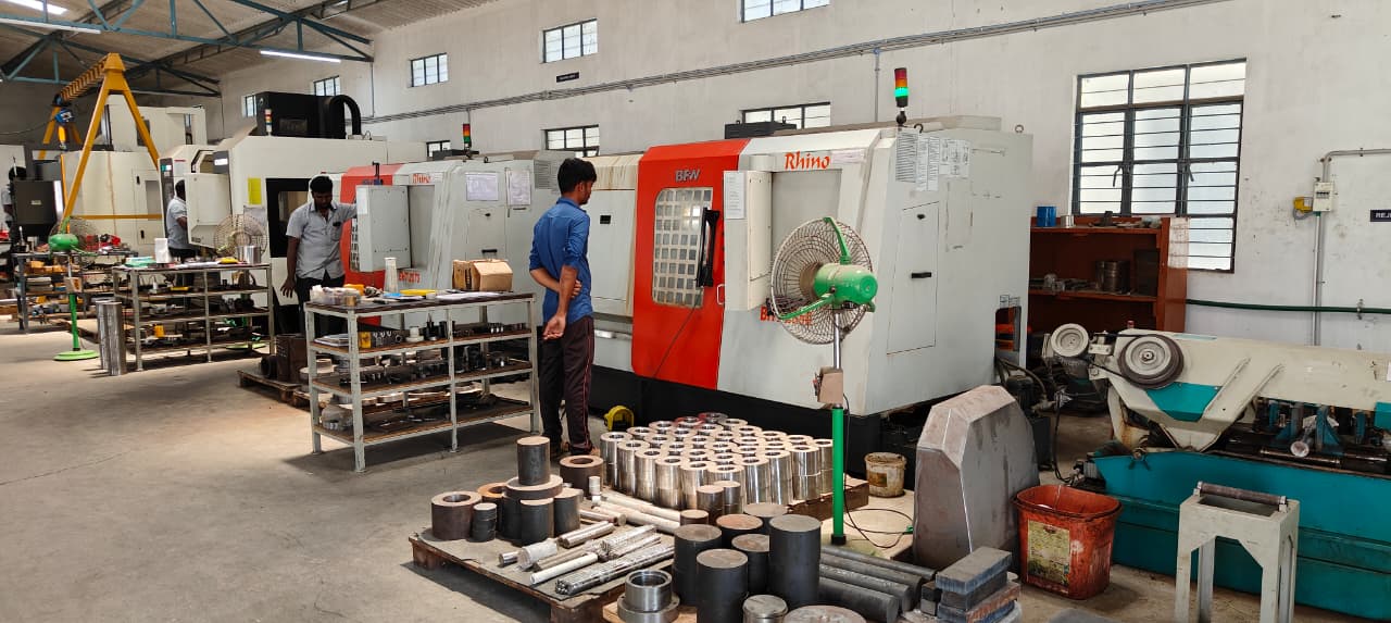 Machining floor with stock material staged for production