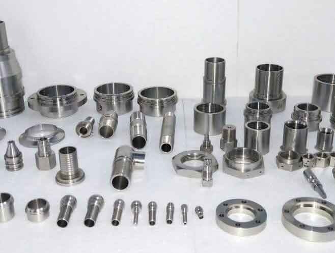 Stainless turned components — fittings, bushings, adapters, and nuts